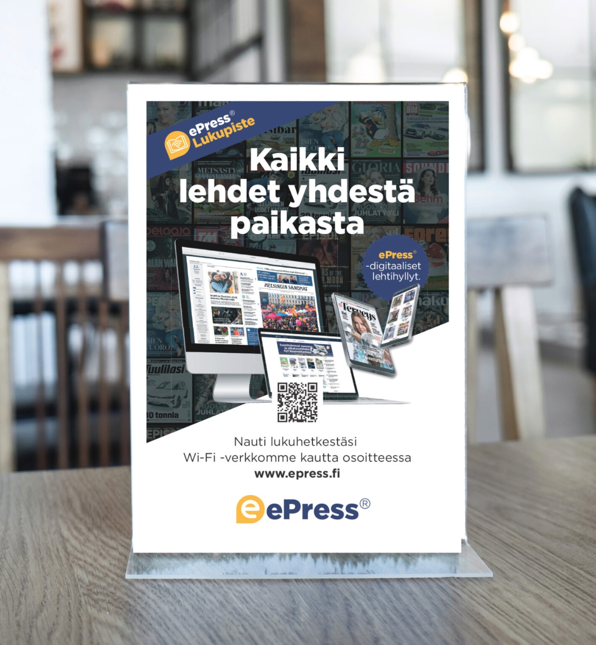 ePress-mainos ravintolapöydällä, esittelee digitaalisten lehtien valikoimaa.